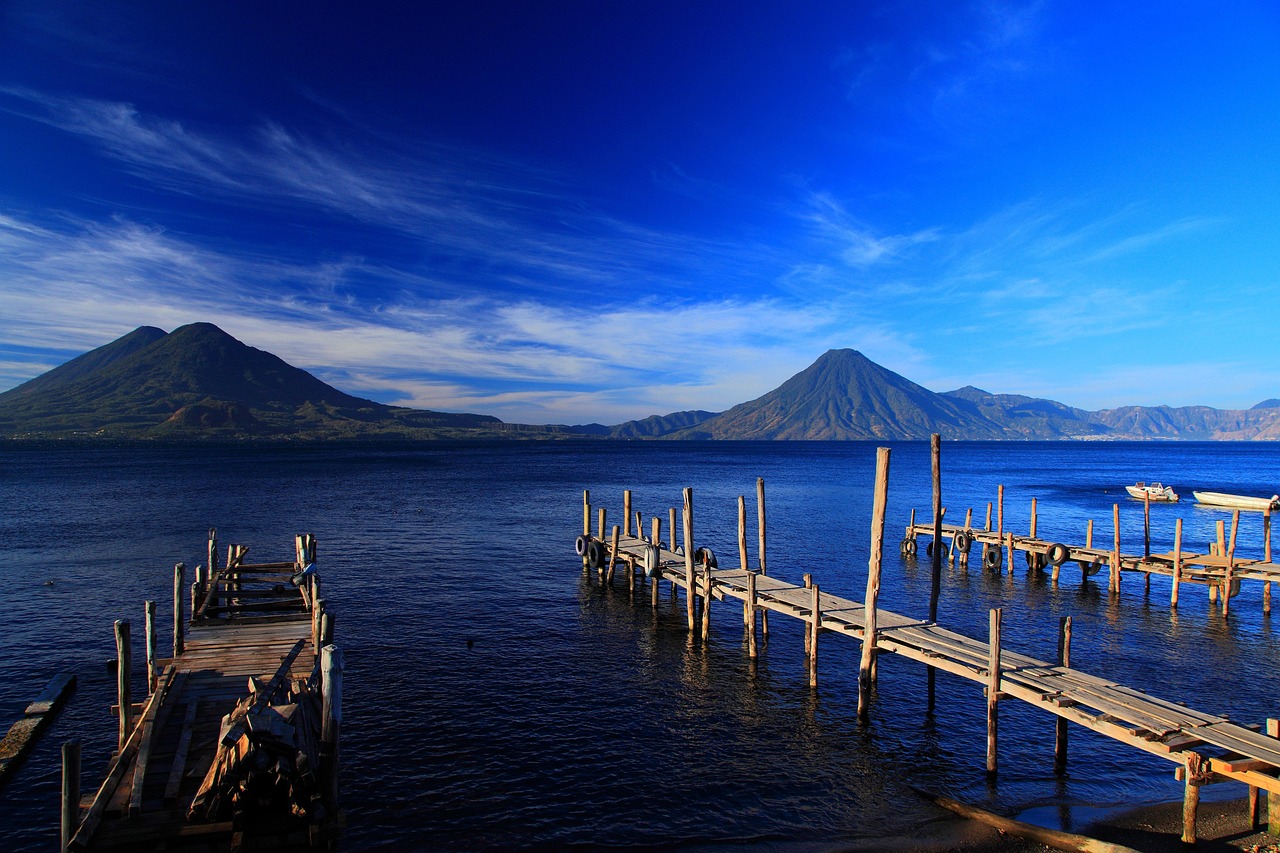 Lake Atitlán and its twin volcanoes at dawn